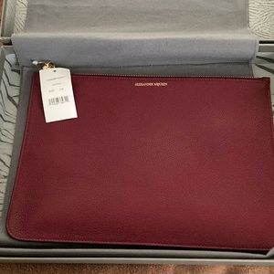 Alexander McQueen pocket book brand new still in original box paid$500 sell $300